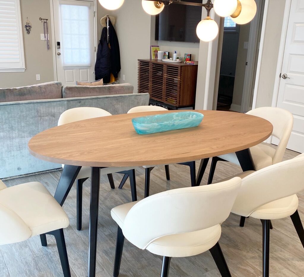 oval dining table with black legs