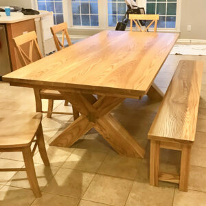 oak colored table with bench and chairs
